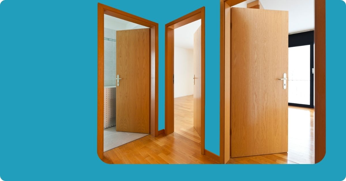 A teal background with 3 open doors.